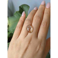 6.96 Ct. Cabochon Rutilated Quartz from Madagascar Life Style