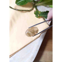 29.77 Ct. Cabochon Rutilated Quartz from Madagascar Life Style