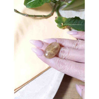 29.77 Ct. Cabochon Rutilated Quartz from Madagascar Life Style