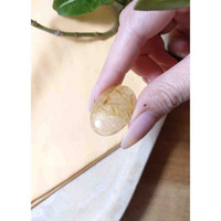 41.73 Ct. Cabochon Rutilated Quartz from Madagascar Life Style