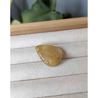 24.34 Ct. Cabochon Rutilated Quartz from Madagascar Life Style