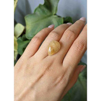 13.39 Ct. Cabochon Rutilated Quartz from Madagascar Life Style