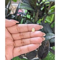 1.74 Ct. Yellowish Green Cabochon Chrysoberyl from Ceylon (Sri Lanka) Life Style