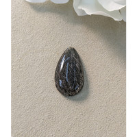 27.78 Ct. Cabochon Rutilated Quartz from Ceylon (Sri Lanka) Life Style