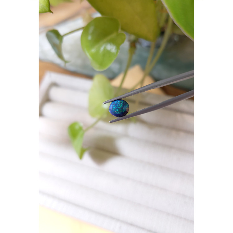 0.74 Ct. Cabochon Black Opal from Australia