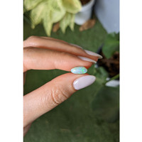 1.09 Ct. Cabochon White Opal from Australia Life Style