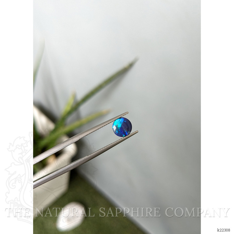 0.76 Ct. Cabochon Black Opal from Australia