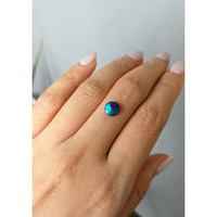 0.76 Ct. Cabochon Black Opal from Australia Life Style