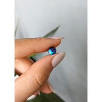 0.76 Ct. Cabochon Black Opal from Australia Life Style