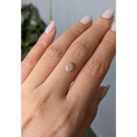 0.34 Ct. Cabochon Semi-Black Opal from Australia Life Style