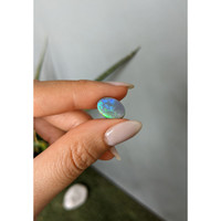 3.29 Ct. Semi-Black Opal from Australia Life Style
