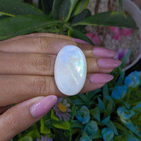 51.38 Ct. Multi Color Cabochon White Opal from Ethiopia Life Style