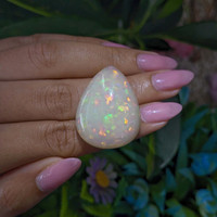 48.45 Ct. Multi Color Cabochon Jelly Opal from Ethiopia Life Style
