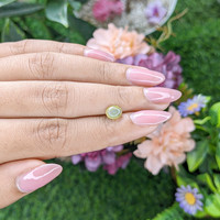 1.44 Ct. Greenish Yellow Cabochon Chrysoberyl from Madagascar Life Style