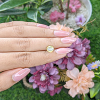 2.02 Ct. Greenish Yellow Cabochon Chrysoberyl from Madagascar Life Style