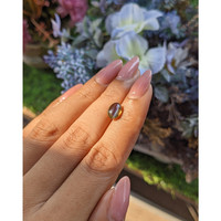2.32 Ct. Greenish Brown Cabochon Chrysoberyl from Tanzania Life Style