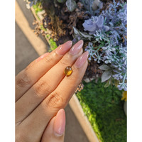 2.05 Ct. Brownish Yellow Cabochon Chrysoberyl from Tanzania Life Style