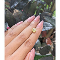 1.76 Ct. Yellowish Green Cabochon Chrysoberyl from Tanzania Life Style