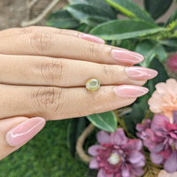 1.94 Ct. Greenish Yellow Cabochon Chrysoberyl from Tanzania Life Style