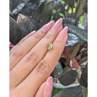 1.94 Ct. Greenish Yellow Cabochon Chrysoberyl from Tanzania Life Style