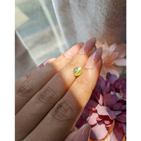 1.67 Ct. Yellowish Green Cabochon Chrysoberyl from Ceylon (Sri Lanka) Life Style