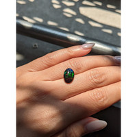 2.31 Ct. Cabochon Black Opal from Ethiopia Life Style