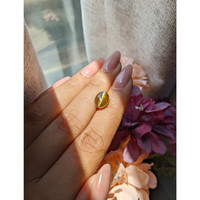 4.60 Ct. Greenish Brown Cabochon Chrysoberyl from Madagascar Life Style