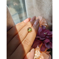 4.32 Ct. Yellowish Green Cabochon Chrysoberyl from Ceylon (Sri Lanka) Life Style
