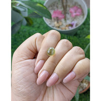 5.66 Ct. Yellowish Green Cabochon Chrysoberyl from Ceylon (Sri Lanka) Life Style