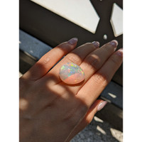 21.14 Ct. Multi Color Cabochon Semi-Black Opal from Ethiopia Life Style