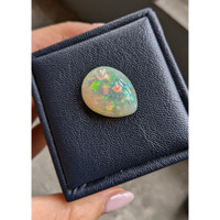 21.14 Ct. Multi Color Cabochon Semi-Black Opal from Ethiopia Life Style