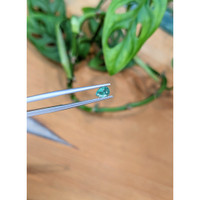 0.42 Ct. Green Grandidierite from Madagascar Life Style