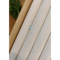 0.12 Ct. Green Grandidierite from Madagascar Life Style