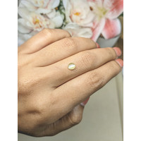 0.50 Ct. Yellowish Green Cabochon Chrysoberyl from Ceylon (Sri Lanka) Life Style