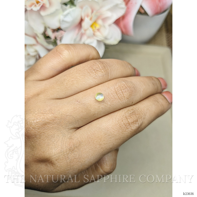0.57 Ct. Greenish Yellow Cabochon Chrysoberyl from Ceylon (Sri Lanka)