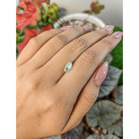 1.85 Ct. Yellowish Green Cabochon Chrysoberyl from Ceylon (Sri Lanka) Life Style