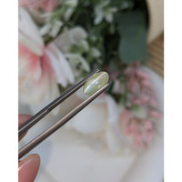 1.85 Ct. Yellowish Green Cabochon Chrysoberyl from Ceylon (Sri Lanka) Life Style
