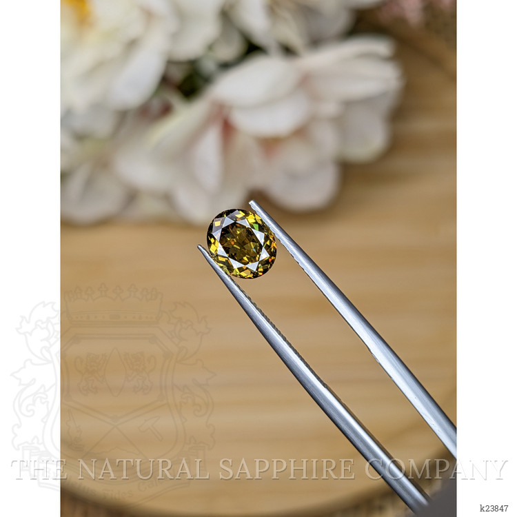 1.62 Ct. Greenish Brown Demantoid Garnet from Madagascar