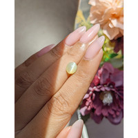 1.65 Ct. Yellowish Green Cabochon Chrysoberyl from Tanzania Life Style