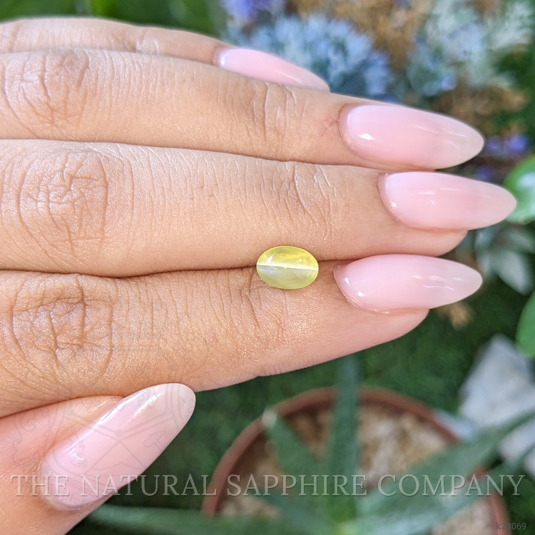 1.63 Ct. Greenish Yellow Cabochon Chrysoberyl from Madagascar