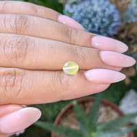 1.76 Ct. Yellowish Green Cabochon Chrysoberyl from Tanzania Life Style