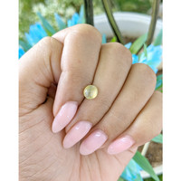 1.31 Ct. Greenish Yellow Cabochon Chrysoberyl from Tanzania Life Style