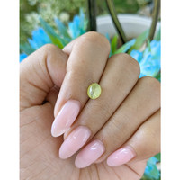 1.47 Ct. Greenish Yellow Cabochon Chrysoberyl from Tanzania Life Style