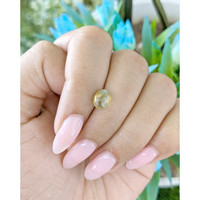 2.27 Ct. Greenish Yellow Cabochon Chrysoberyl from Tanzania Life Style