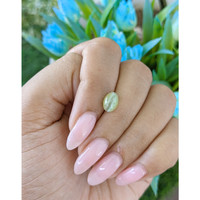 2.32 Ct. Yellowish Green Cabochon Chrysoberyl from Tanzania Life Style
