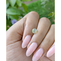 1.13 Ct. Yellowish Green Cabochon Chrysoberyl from Tanzania Life Style