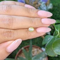 1.13 Ct. Yellowish Green Cabochon Chrysoberyl from Tanzania Life Style