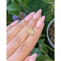 2.83 Ct. Greenish Yellow Cabochon Chrysoberyl from Tanzania Life Style