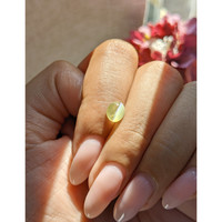 1.50 Ct. Greenish Yellow Cabochon Chrysoberyl from Tanzania Life Style