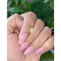 1.94 Ct. Greenish Yellow Cabochon Chrysoberyl from Tanzania Life Style
